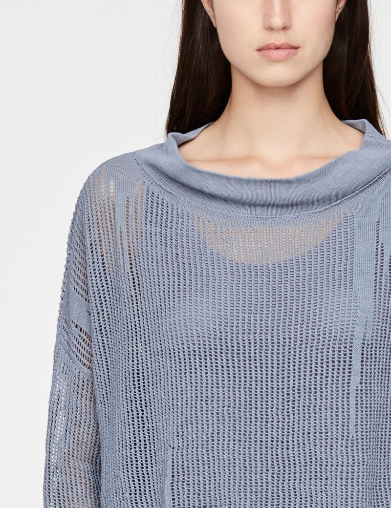 Sarah Pacini trui met gaatjes - lange mouwen
