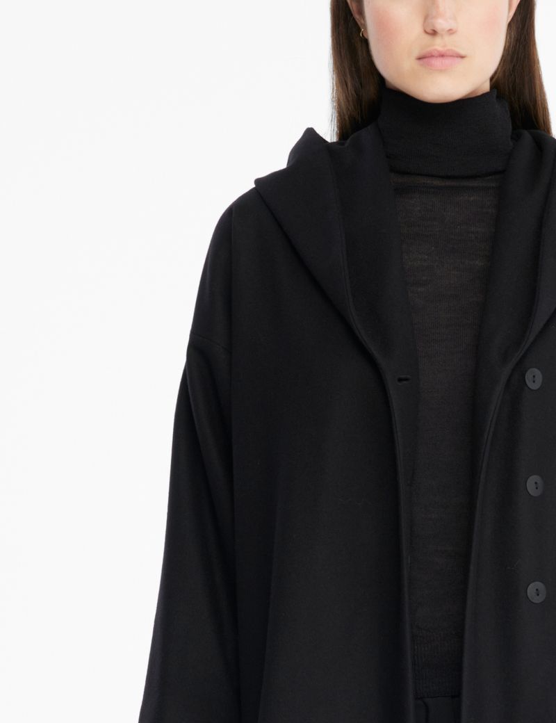 Black wool felt wool coat – hood by Sarah Pacini