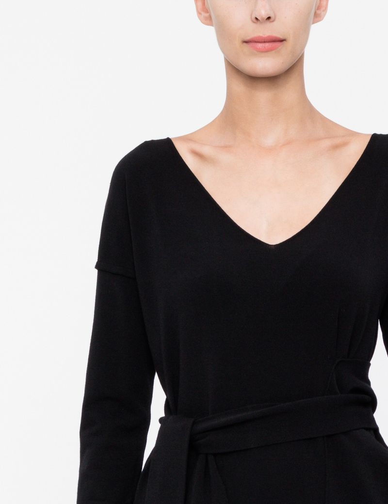 Black knee-length dress with sash by Sarah Pacini