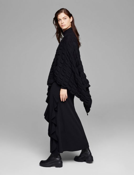 Black knit dress - ruffled details by Sarah Pacini