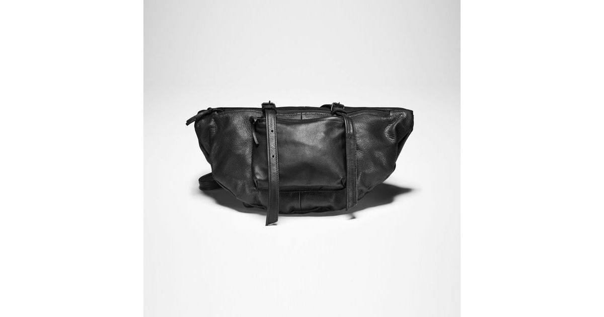 Black leather leather shoulder bag by Sarah Pacini
