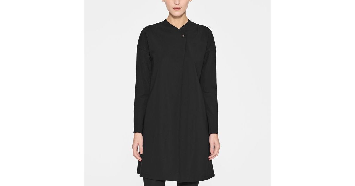 Black polyamide long jacket by Sarah Pacini
