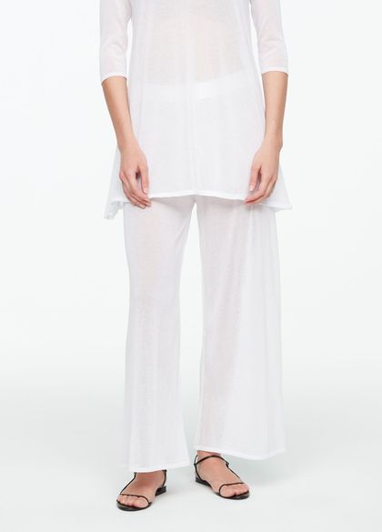 White linen linen gaucho pants by Sarah Pacini