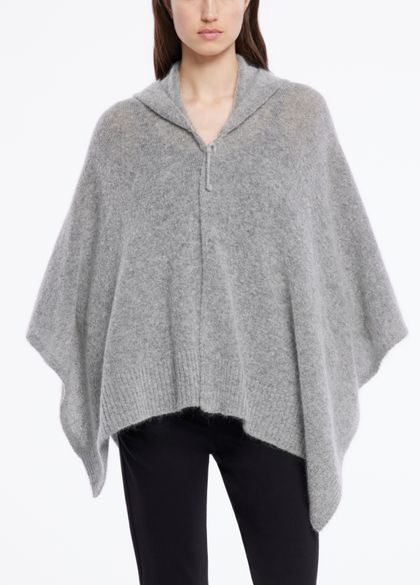 Buy your women's ponchos online at Sarah Pacini